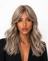 Cora — melted blonde long wavy with fringe bangs wig, front view