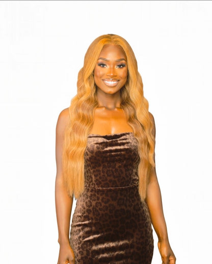 Apricot Wavy Long Middle Part Lace Front Wig. Badra.